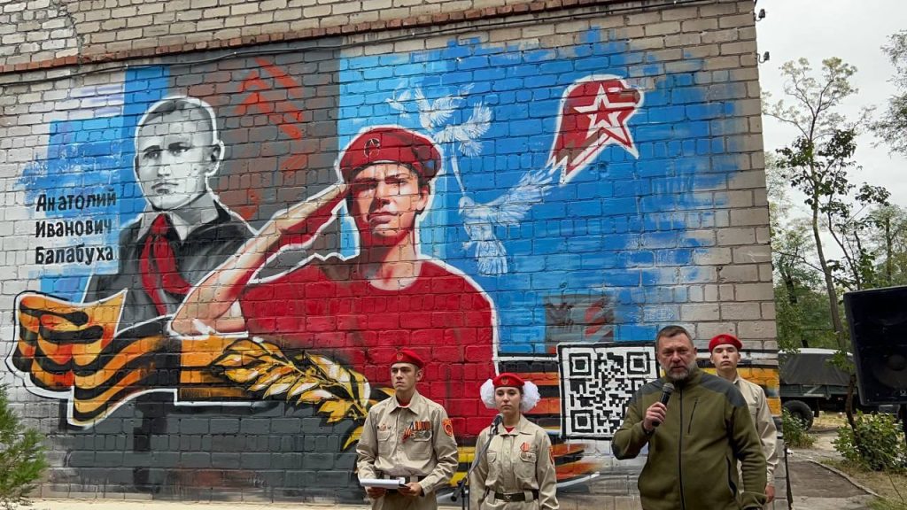 A mural for fictional heroes at a school in Mariupol
